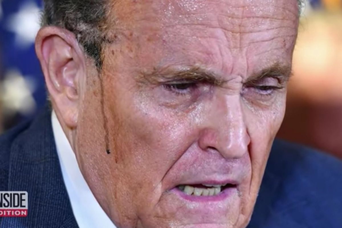 Rudy Giuliani’s Hair Dye Runs Down The Sides of His Face During Press