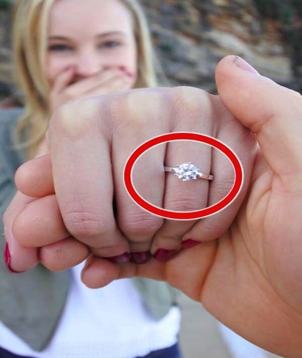 She accepted his diamond ring engagement proposal, and she was in the