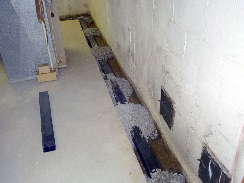 Installing a Basement Sump Pump and Perimeter Drain for Wet Basement