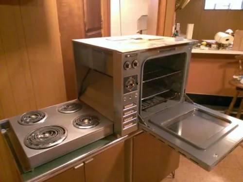 1960 countertopheight Hotpoint oven with hideaway folddown electric