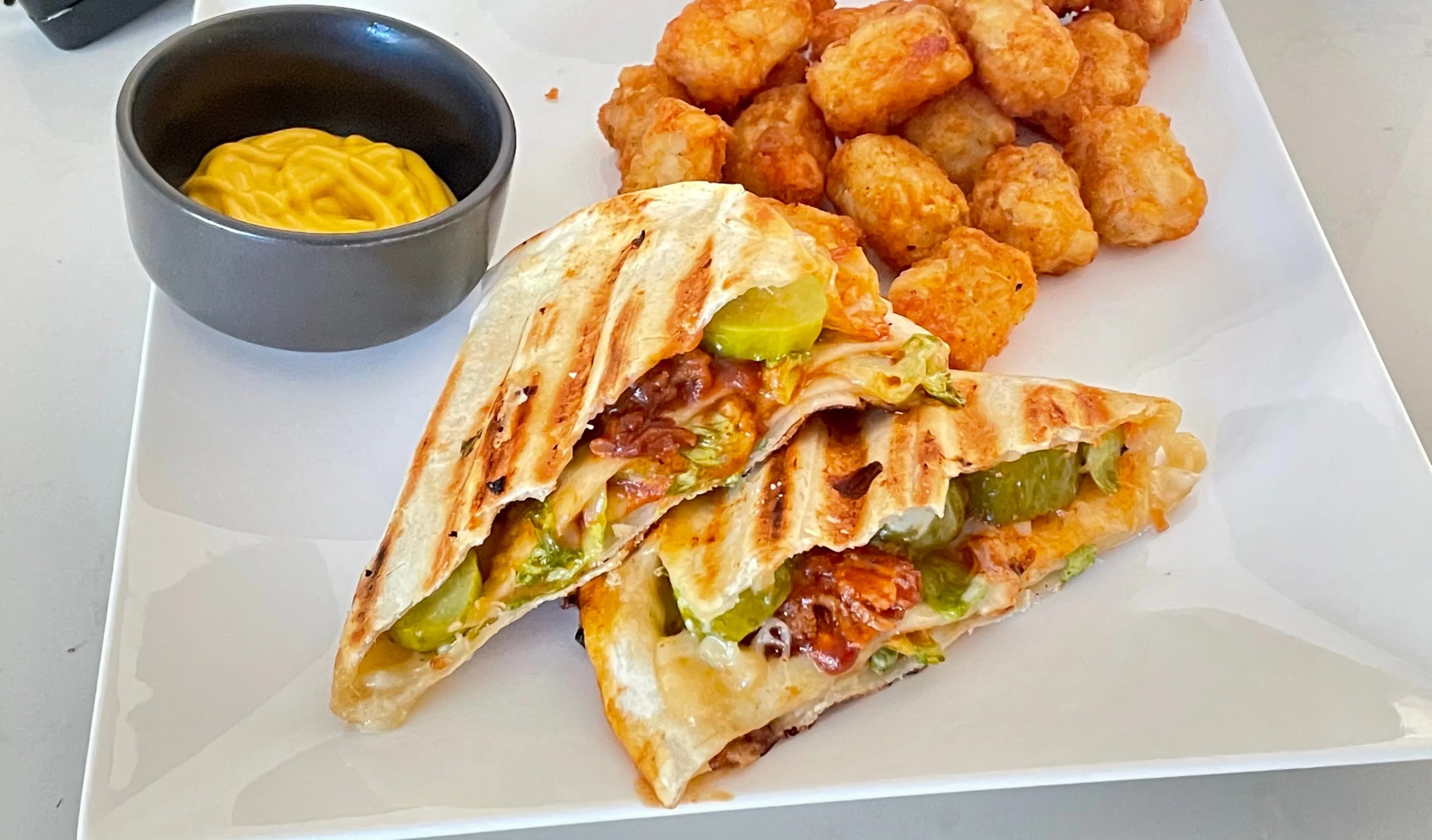 The OG Toasterdilla Pulled Pork & Pepper Jack Triangle Fold Quesadill