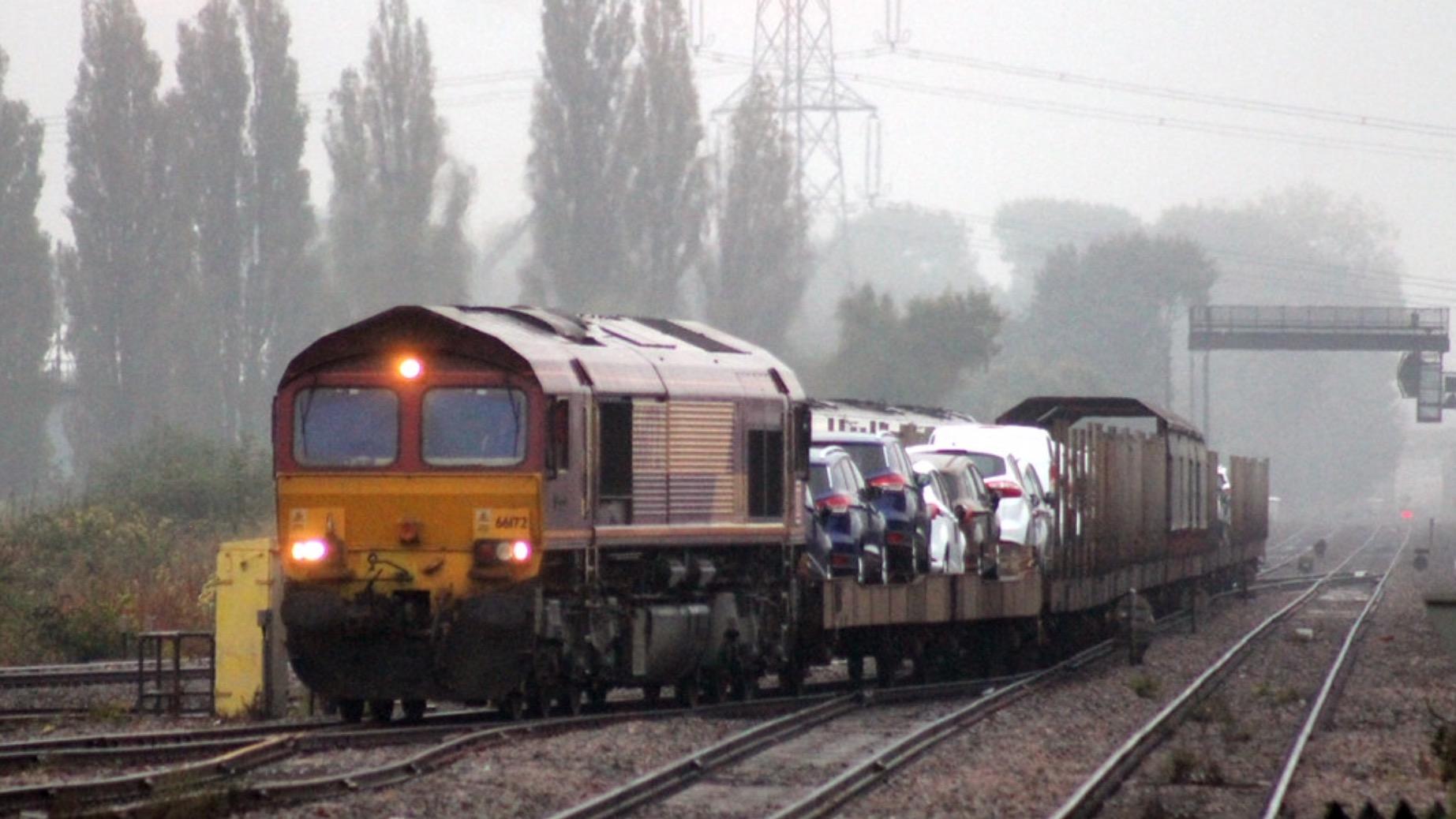 Multicoloured car carriers... Revolution Trains