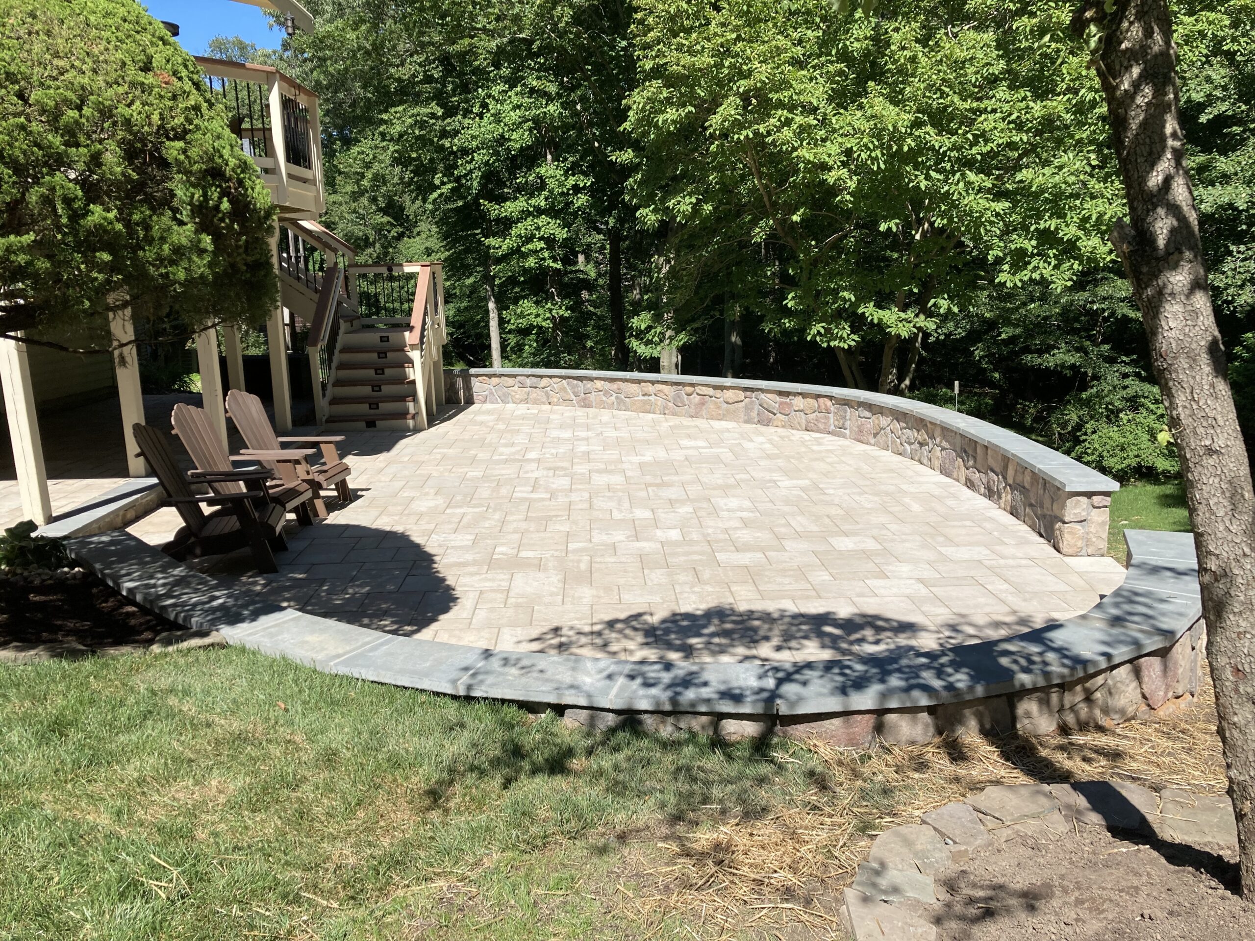 Stone patio and wall Ricky's Lawn & Landscaping