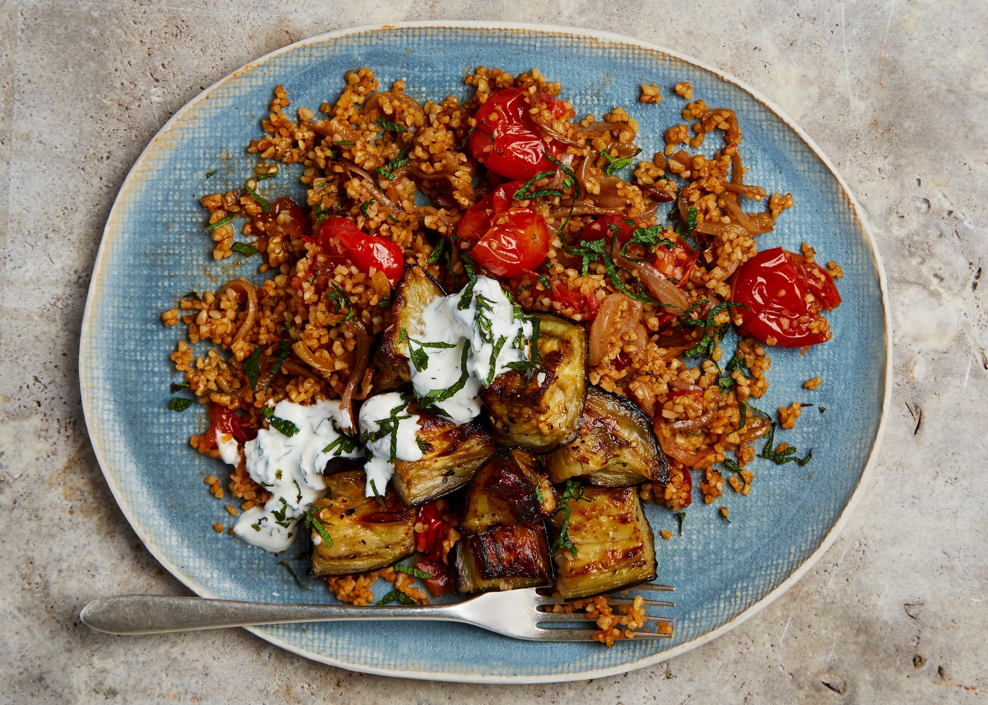 Recipe Yotam Ottolenghi’s Bulgur with tomato, aubergine and preserved