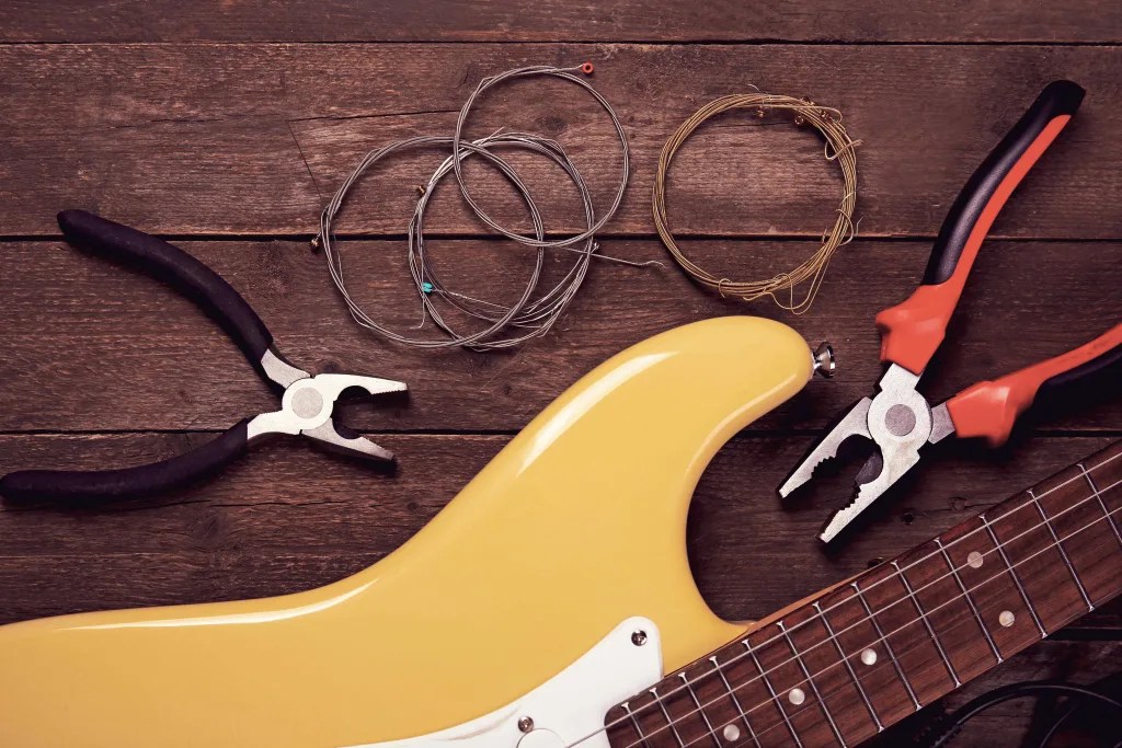 How to cut guitar strings without wire cutter? [Updated