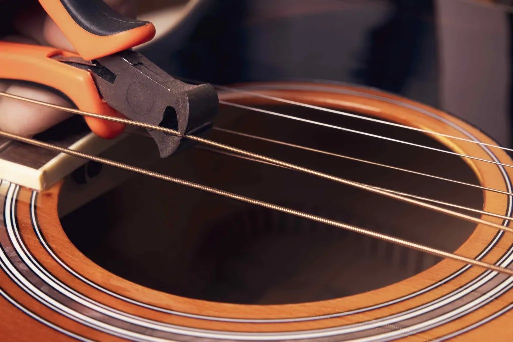 How to cut guitar strings without wire cutter? [Updated