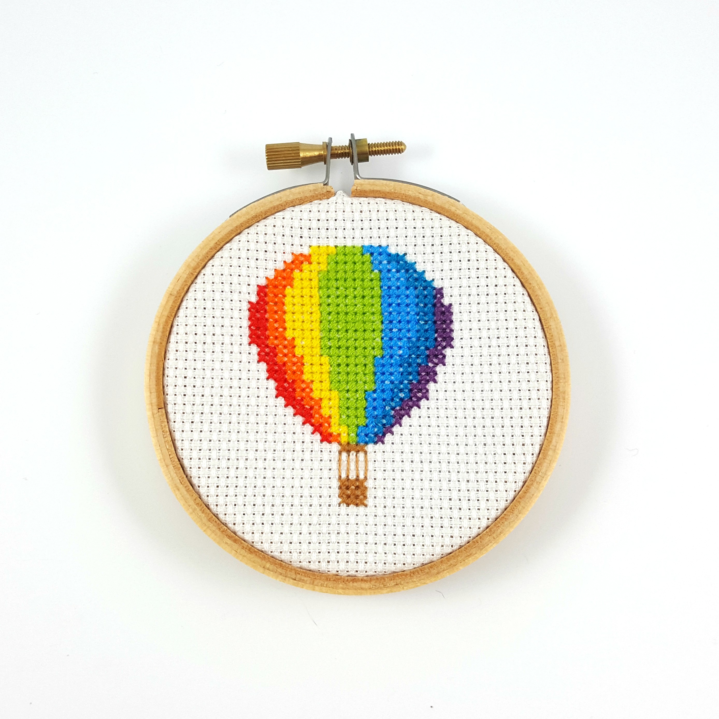 Finished rainbow hot air balloon cross stitch Ringcat Design