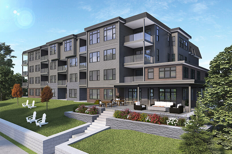 River’s Edge Bracebridge condos landscaped patio with stairs down to dock