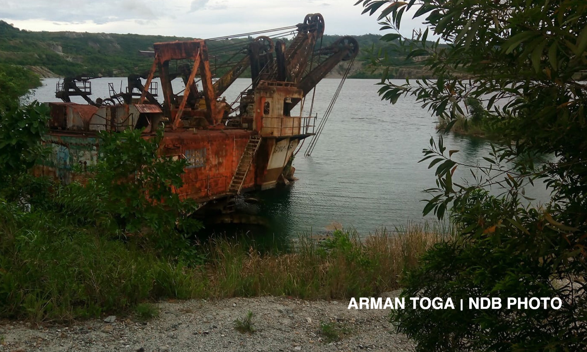 MARICALUM MINING NBI operatives seized heavy equipment, firearms in
