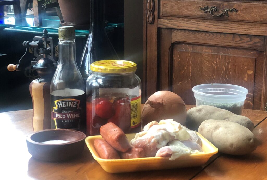 Sausage and Chicken with Vinegar Peppers