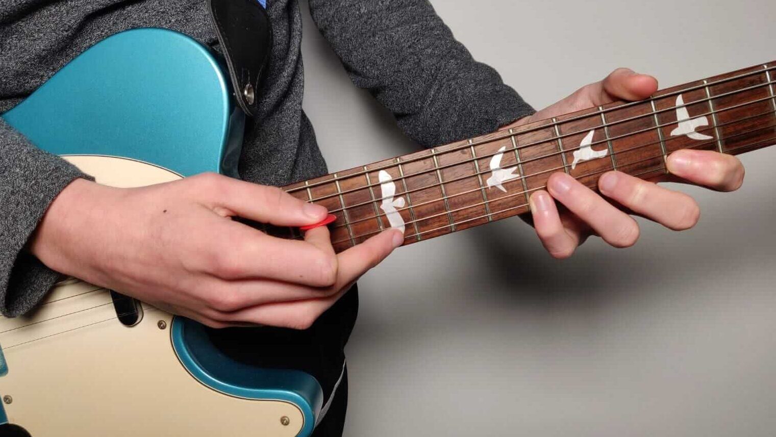 How To Reduce String Noise On Acoustic Guitar