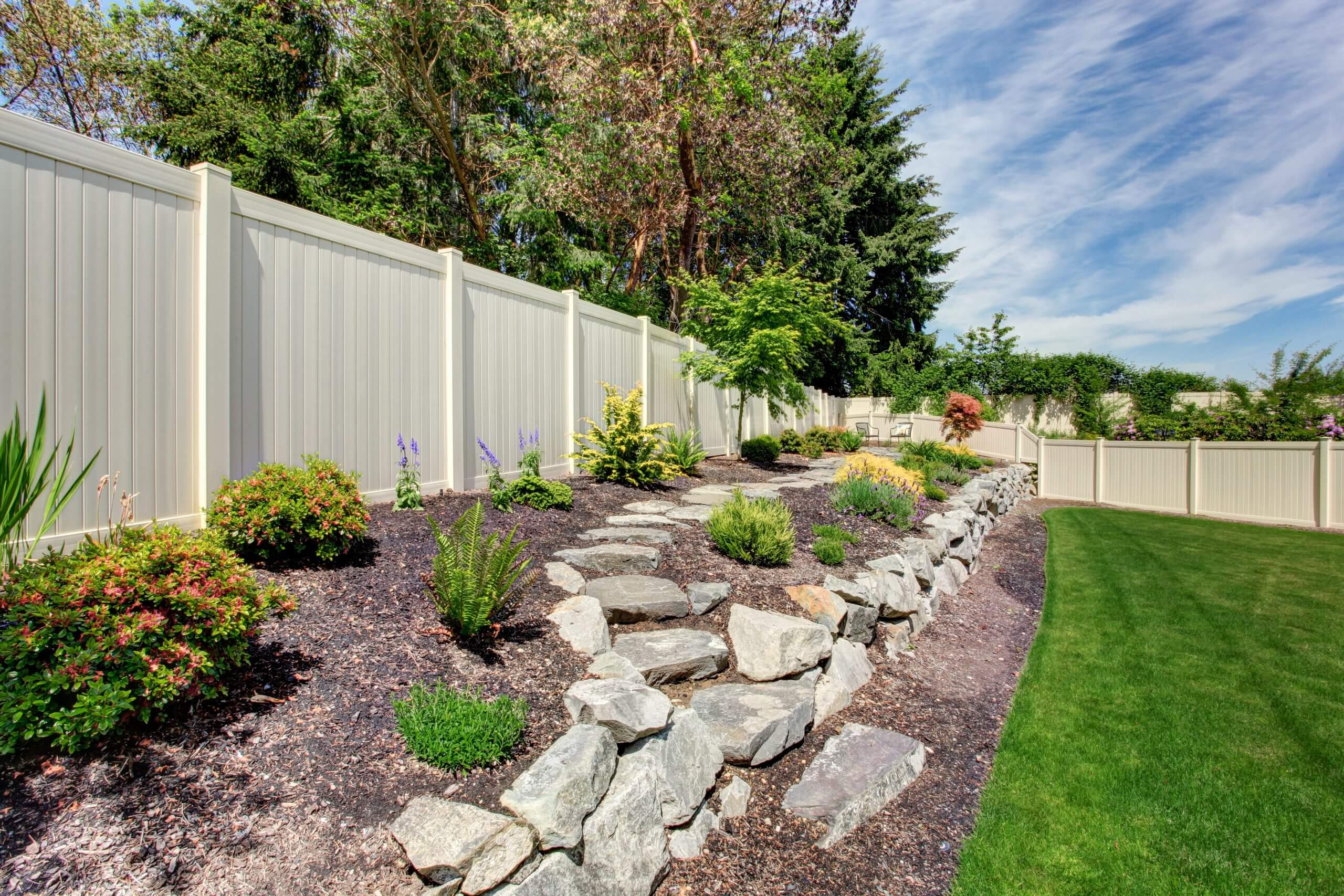 How Do You Landscape Around a Fence?