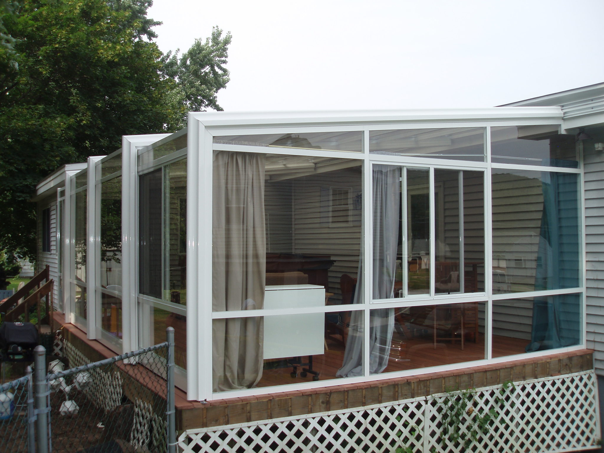 Hot Tub Sunroom Manufactured by RollACover, Intl.America's Leading