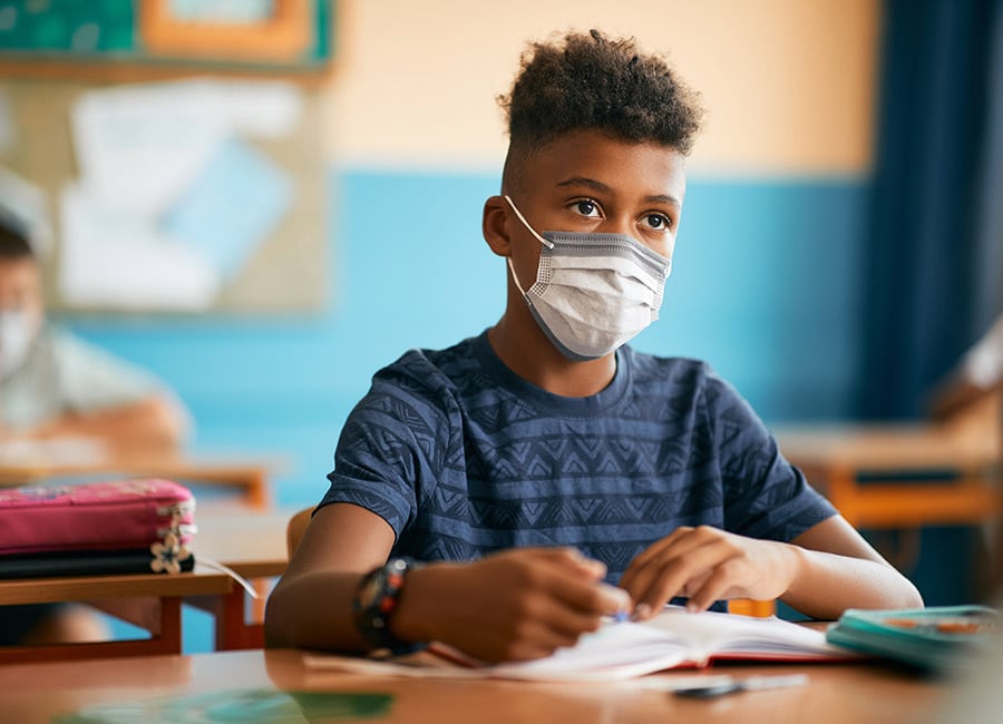 Masks should continue to be worn in schools and on public transport