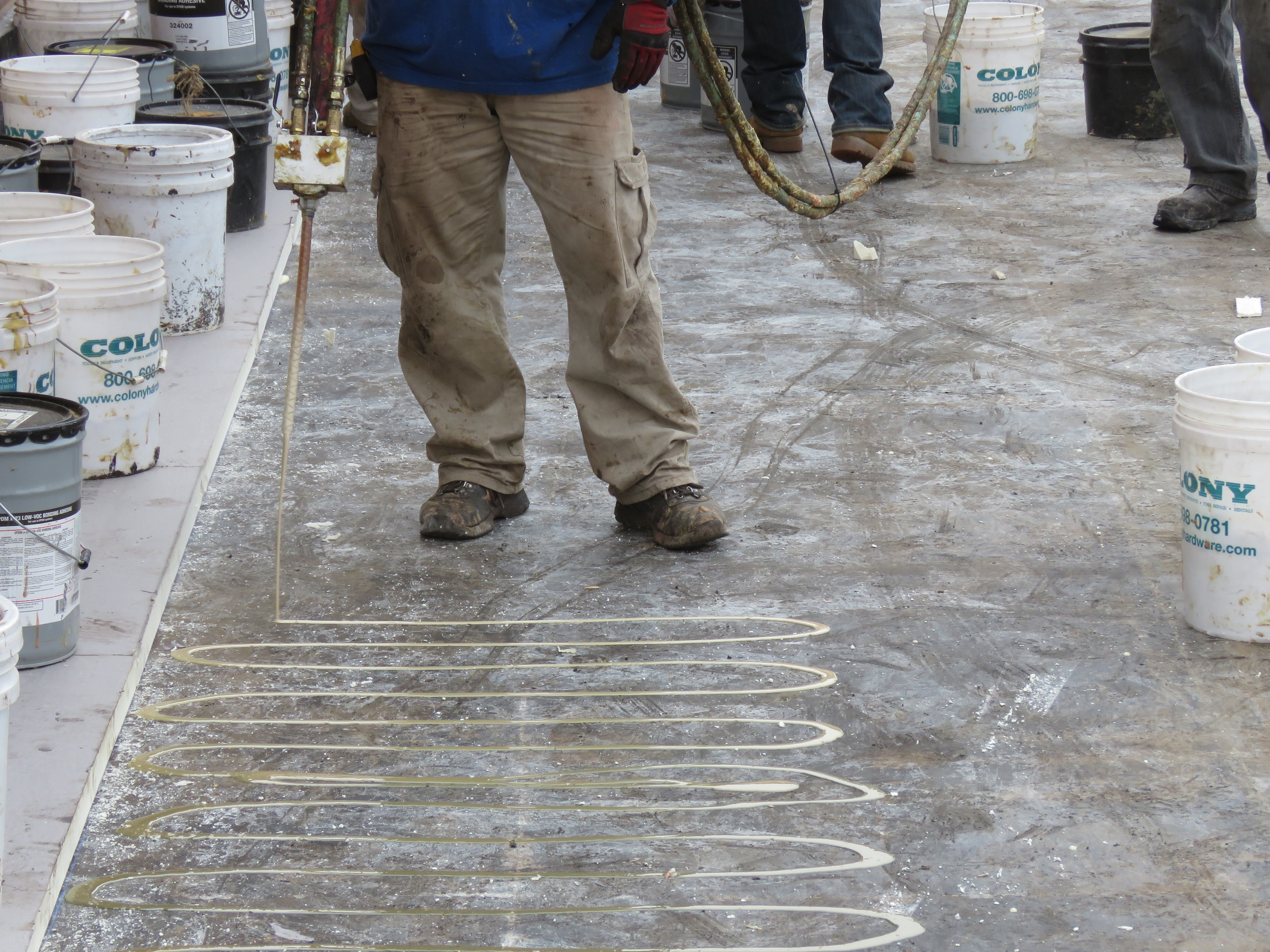 Pictures Setting Polyiso Insulation Boards in Foam Adhesive Roof Help