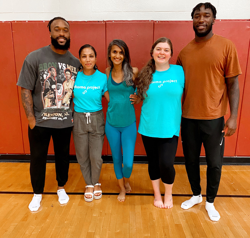 NFL players connect with Carver football team through yoga Rough Draft Atlanta