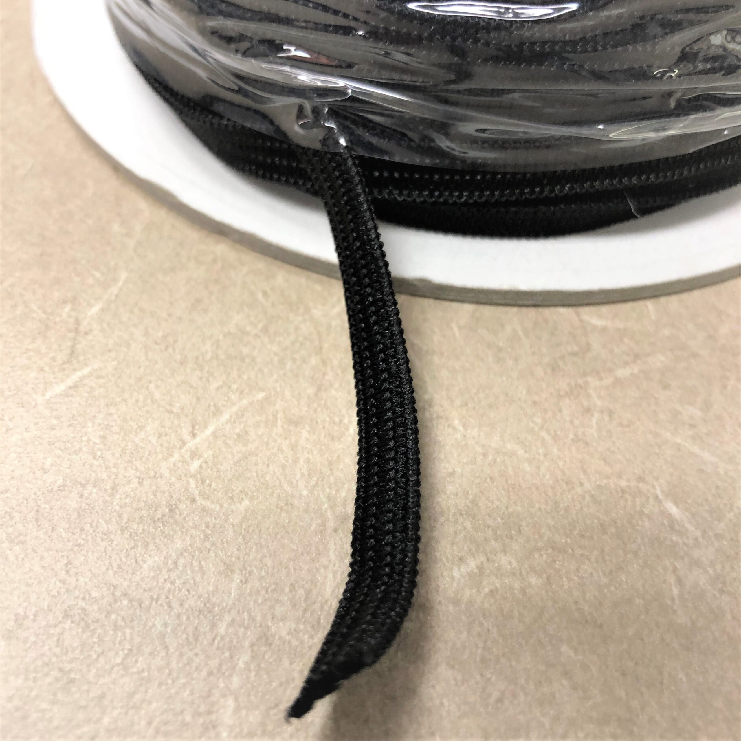 1/4" Black Elastic (Polyester) 125 yard roll Royal Upholstery