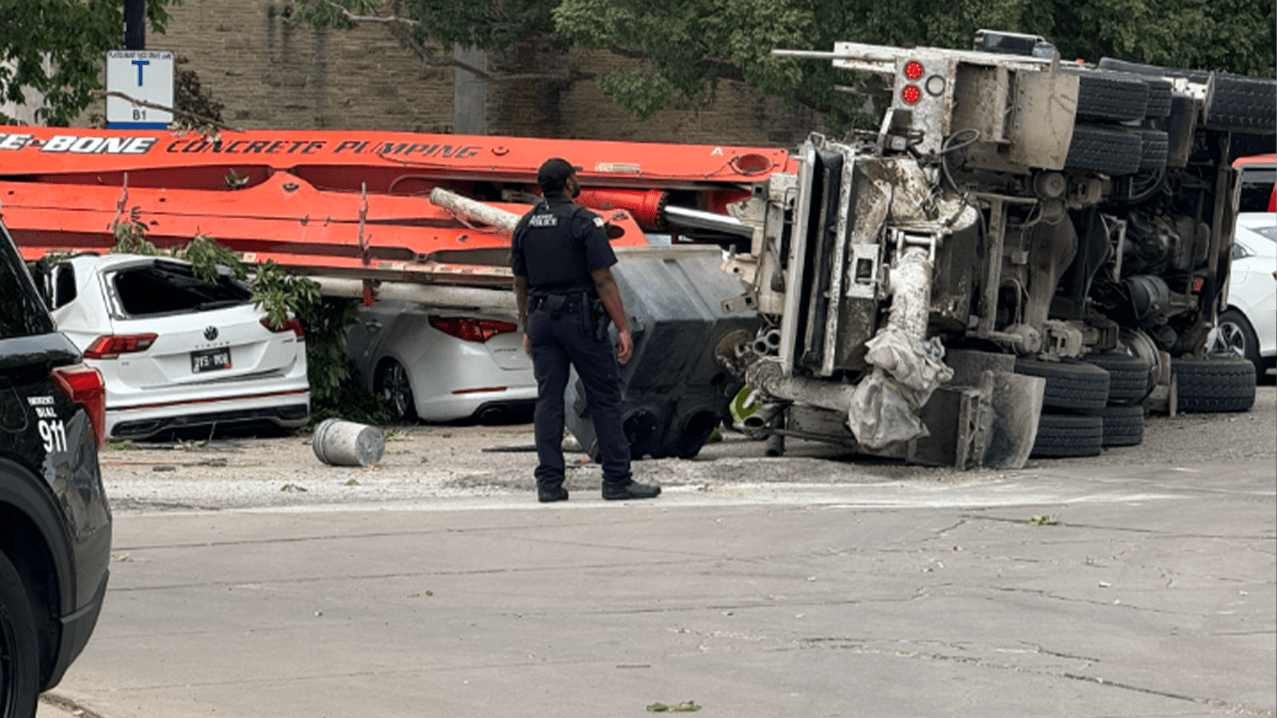 Concrete Pump Truck Falls, Damages Vehicles At K-State Parking Lot 1 ywAAAAAAQABAAACAUwAOw==