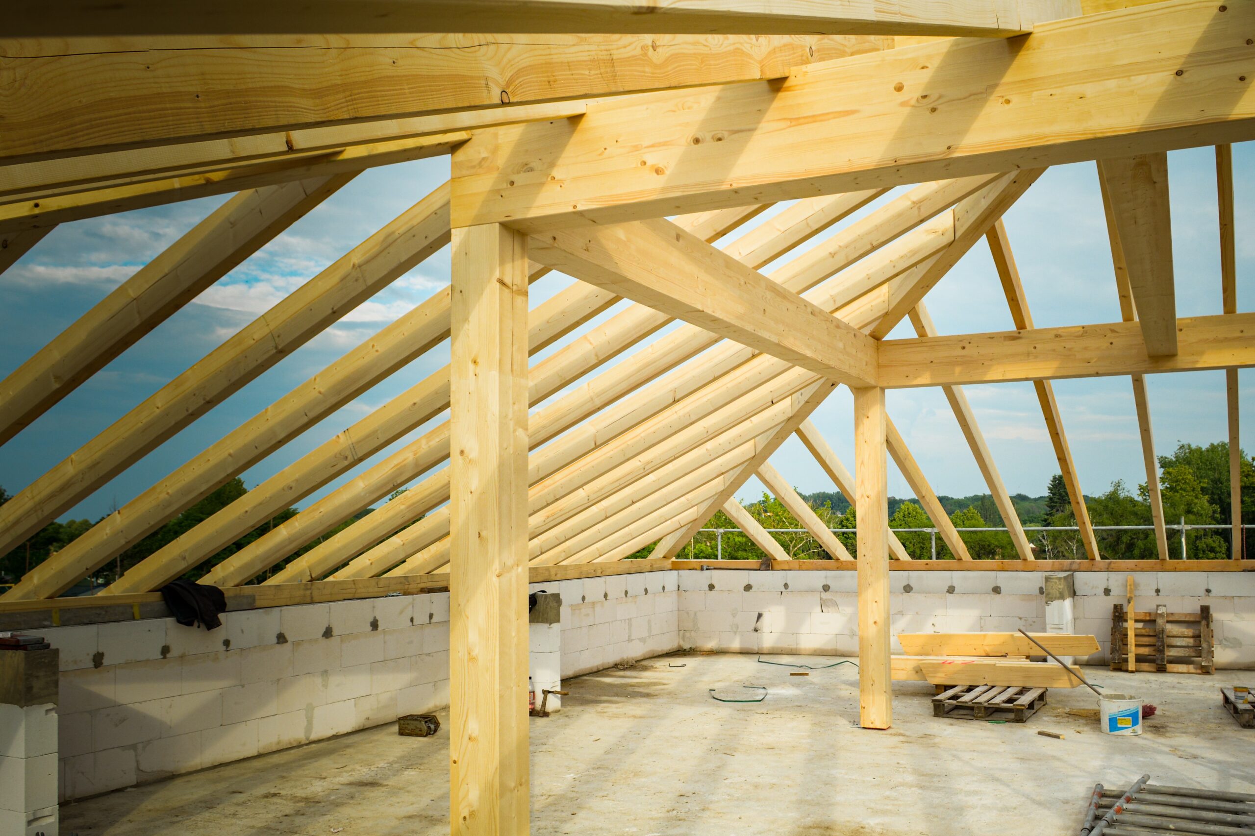 Hand cut rafters vs manufactured trusses Which is better for your home