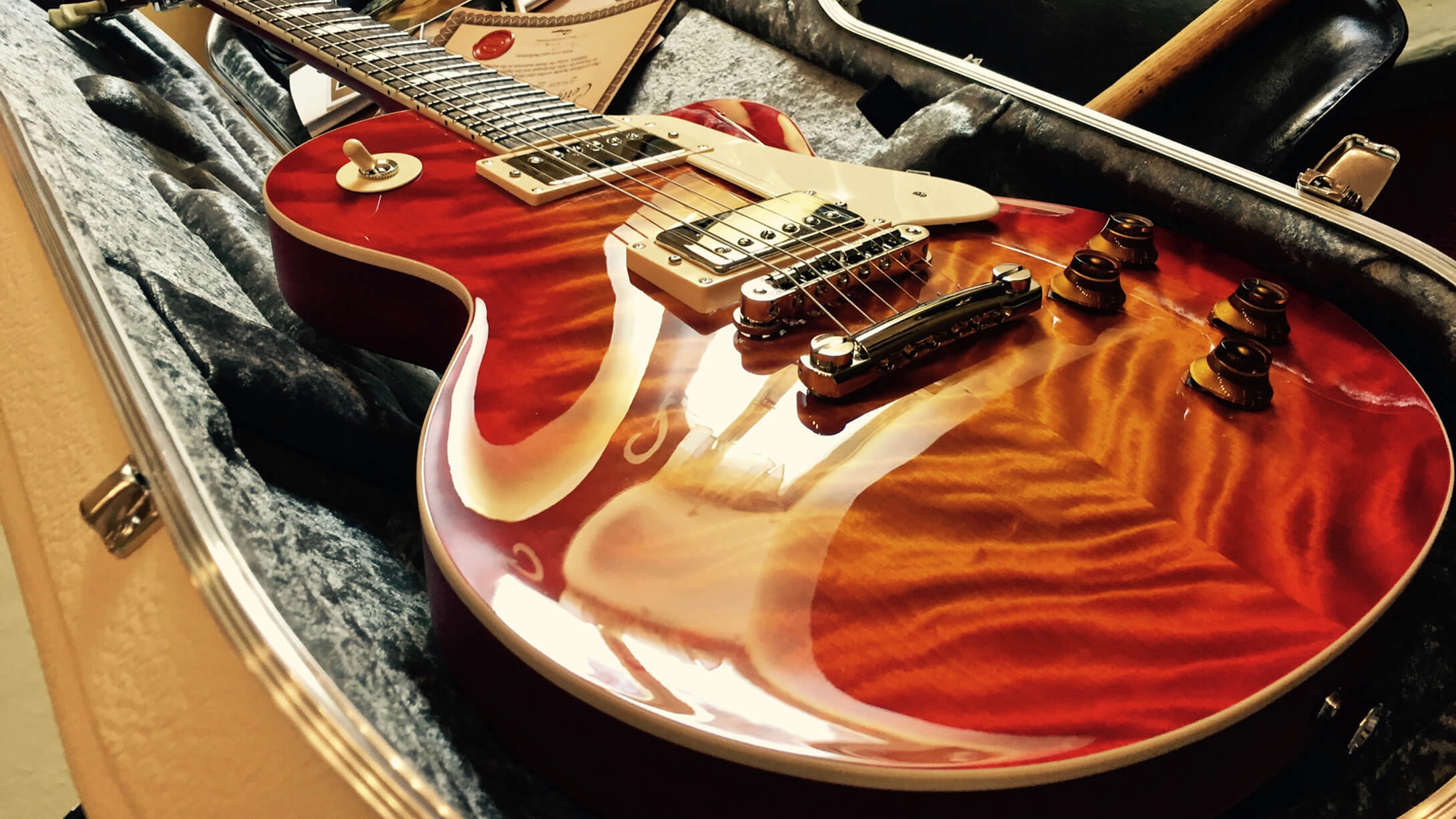 What attributes make a guitar finish play, sound and look right?