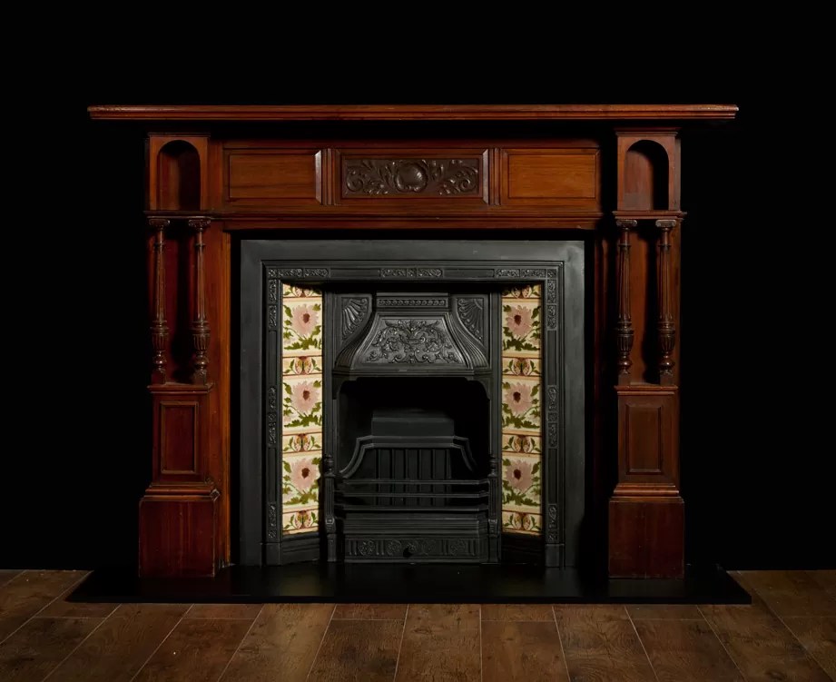 Carved Victorian walnut antique fireplace