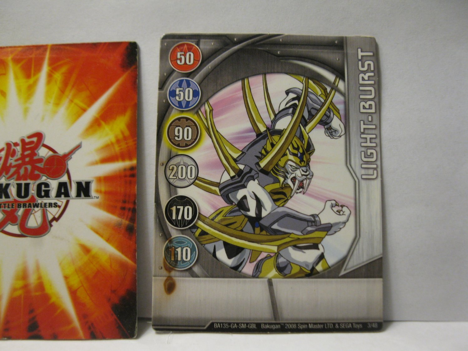 2008 Bakugan Card 3/48 LightBurst ( BA135GASMGBL )