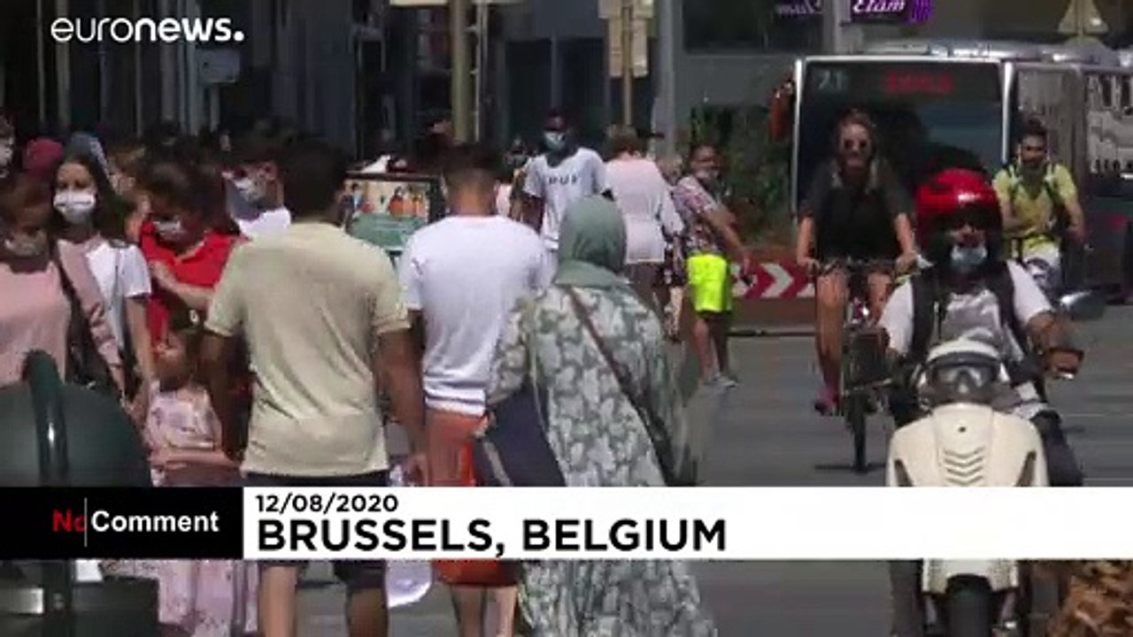 Brussels makes face masks mandatory to stop virus spread video