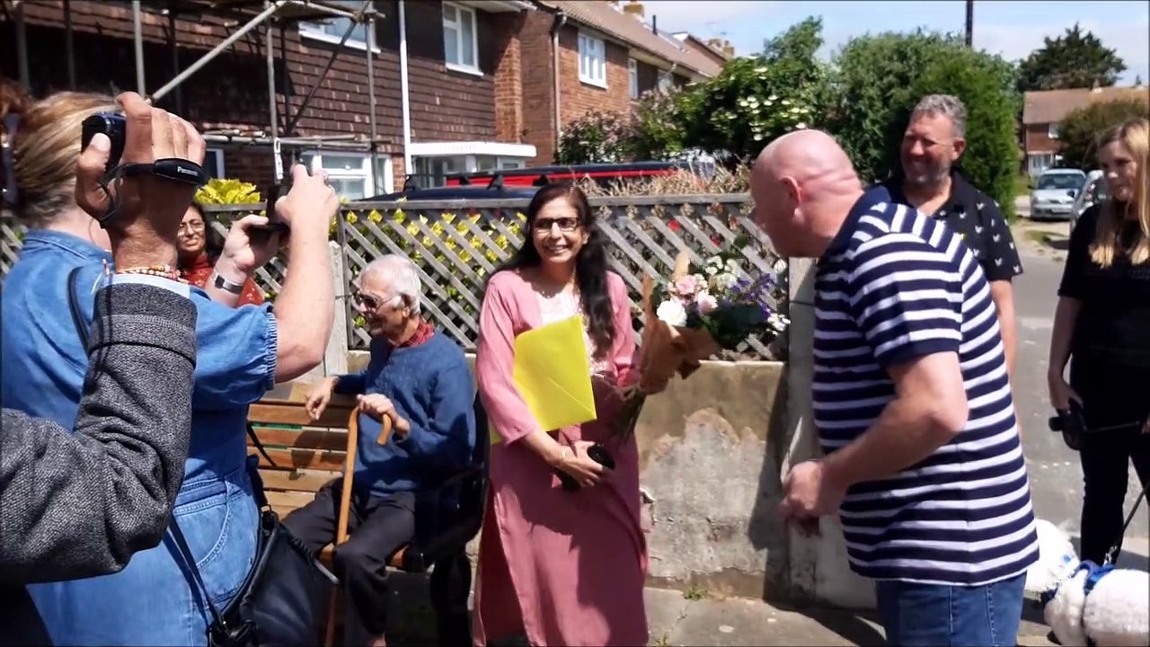 The whole community comes out to wish the owner of a Shoreham post