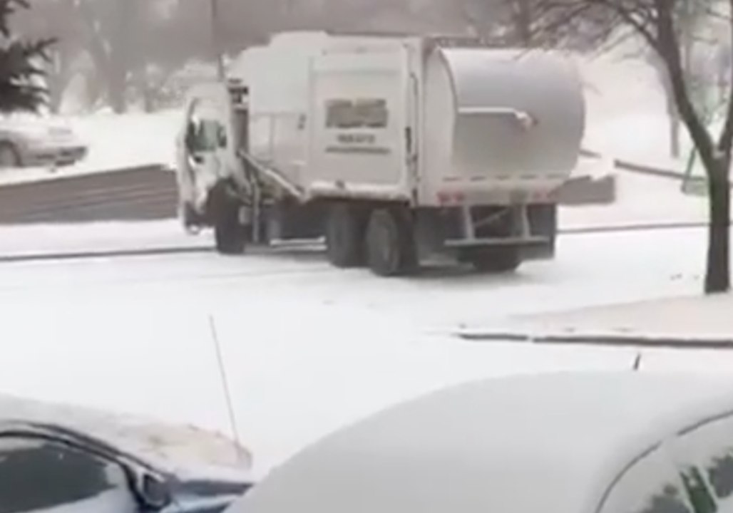 Garbage Truck Slides Sideways on Icy Bismarck, North Dakota, Road