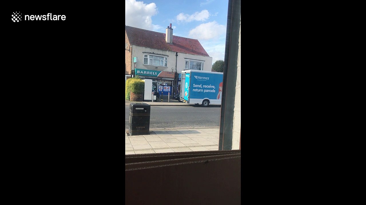 Hermes delivery driver seen throwing packages carelessly into back of