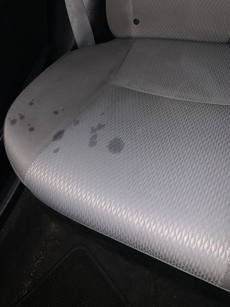 “a 50 ‘damage’ fee for droplets of water on a cloth seat in a very