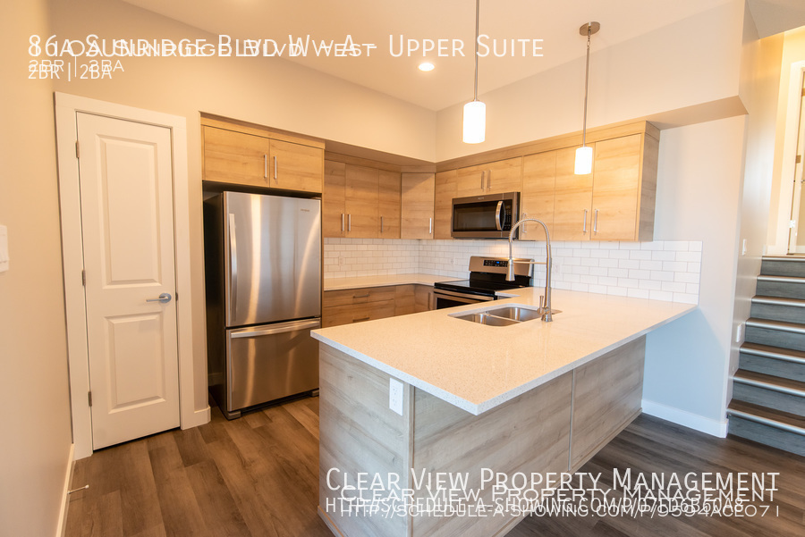 86a Sunridge Blvd W A Upper Suite, Lethbridge, AB T1J 5B7 Clear