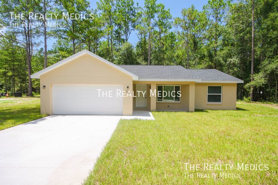 303 Sequoia Dr, Ocklawaha, FL 32179 The Realty Medics