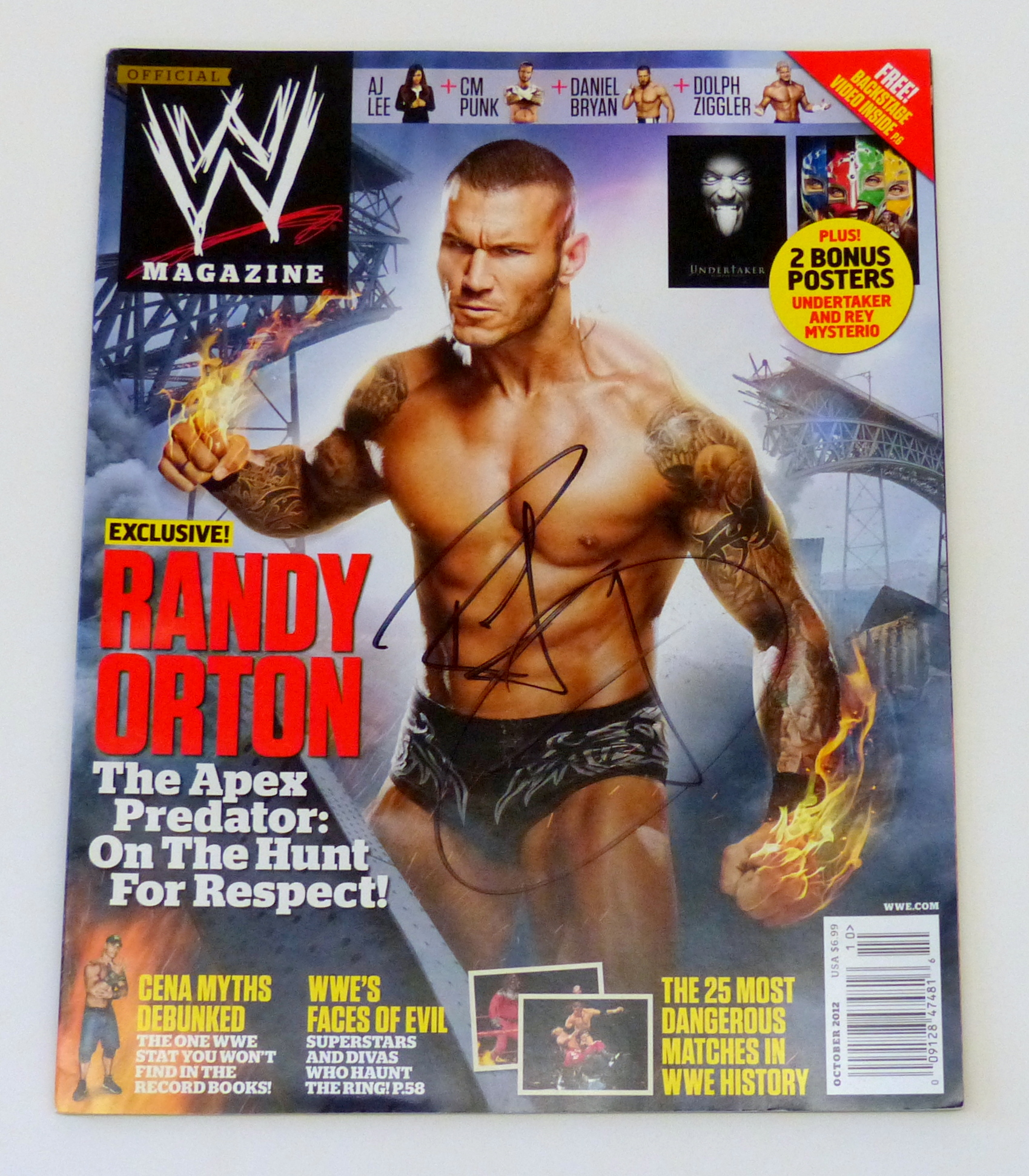 Charitybuzz Collect a WWE Magazine from October 2012 Featuring and Si... Lot 3440123