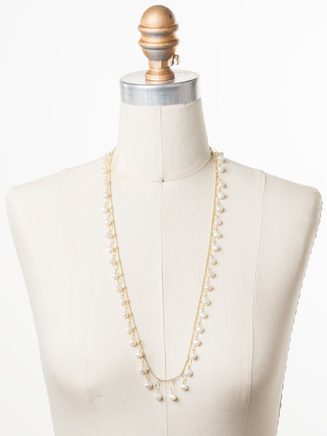 Milana Long Strand Necklace in Bright Goldtone Polished Pearl