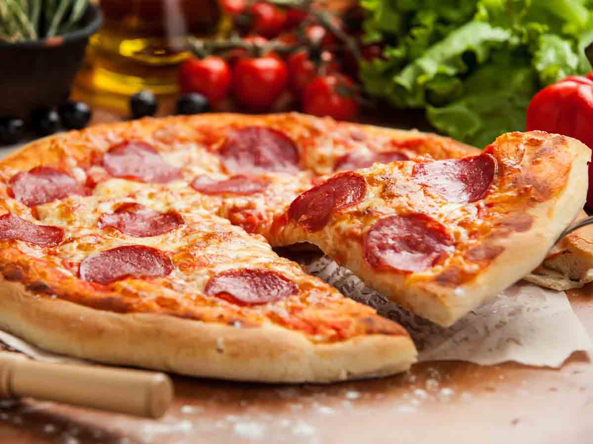 Calories in Digiorno pizza deep dish three meat by Kraft