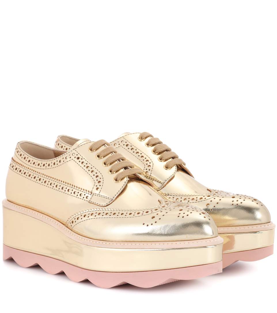 PRADA Gold Leather Waved Sole Flatform Brogues in Silver ModeSens