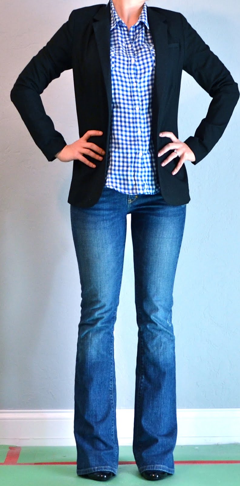 outfit posts blue plaid shirt, black jacket, jeans