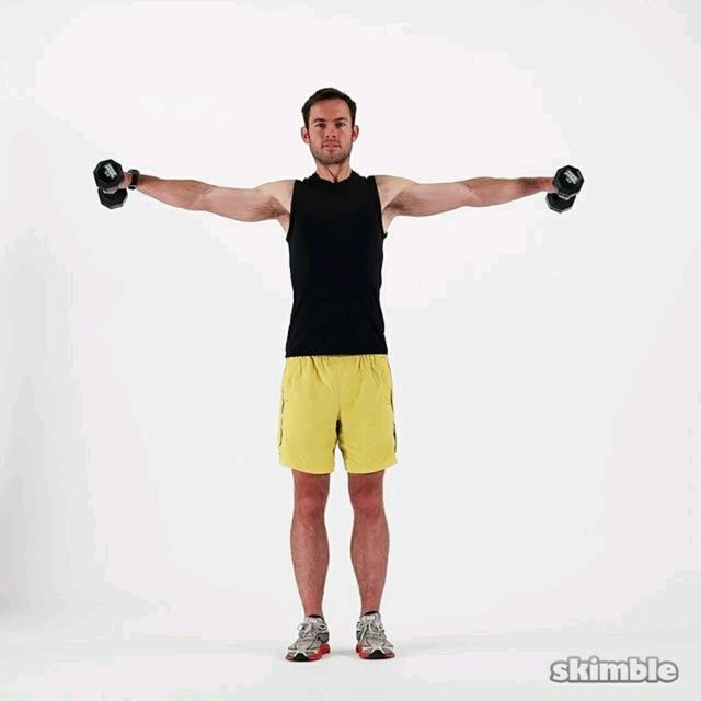 In & Out Shoulder Fly Exercise Howto Workout Trainer by Skimble