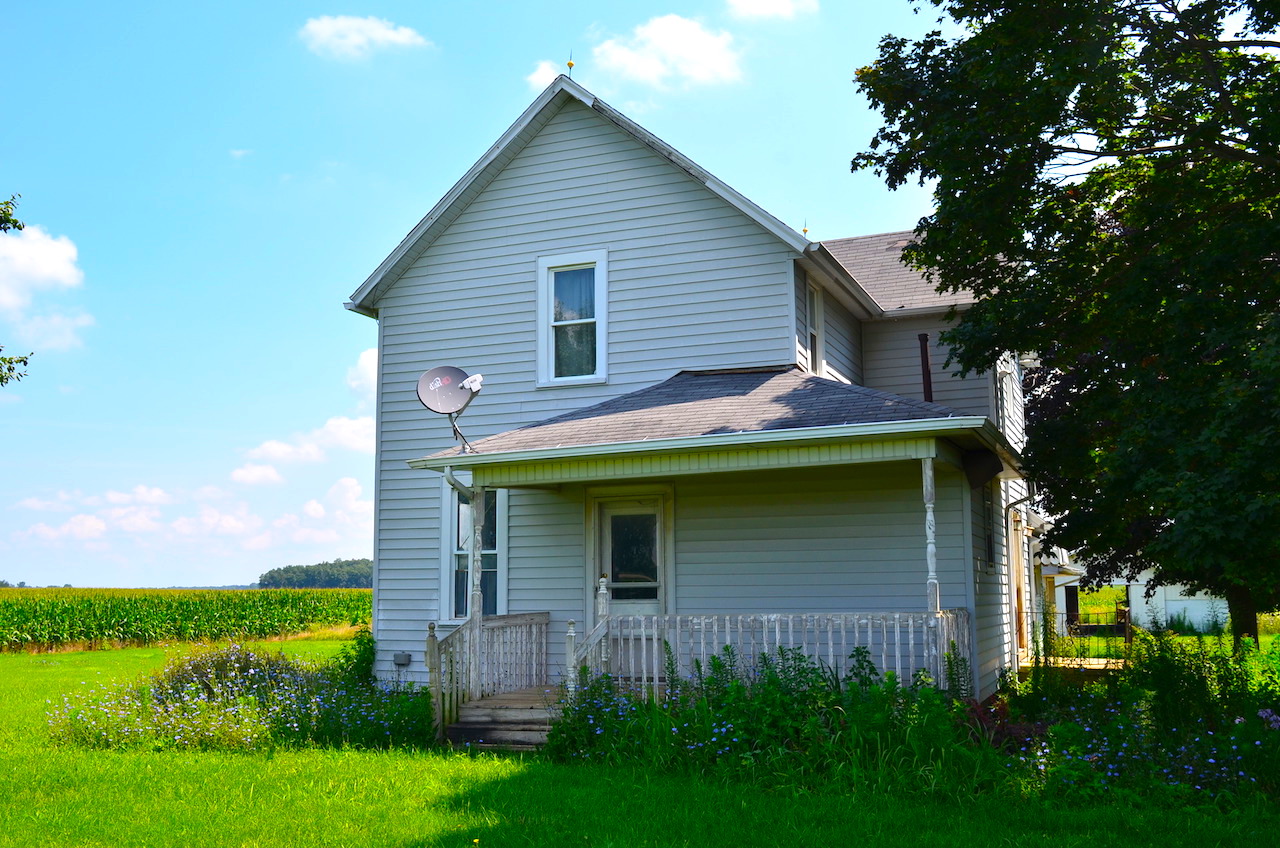 3 bedroom farm home with garage and outbuildings on 2