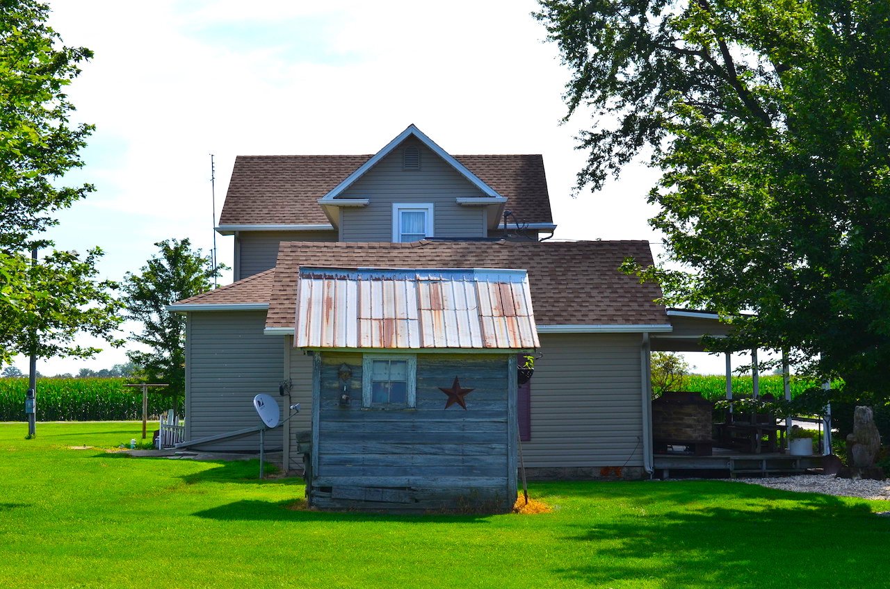 Well maintained 4 bedroom home and outbuildings in Bluffton Indiana