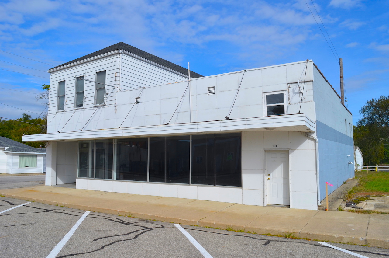 5100 sf building with retail & apartments in Rome City Scheerer