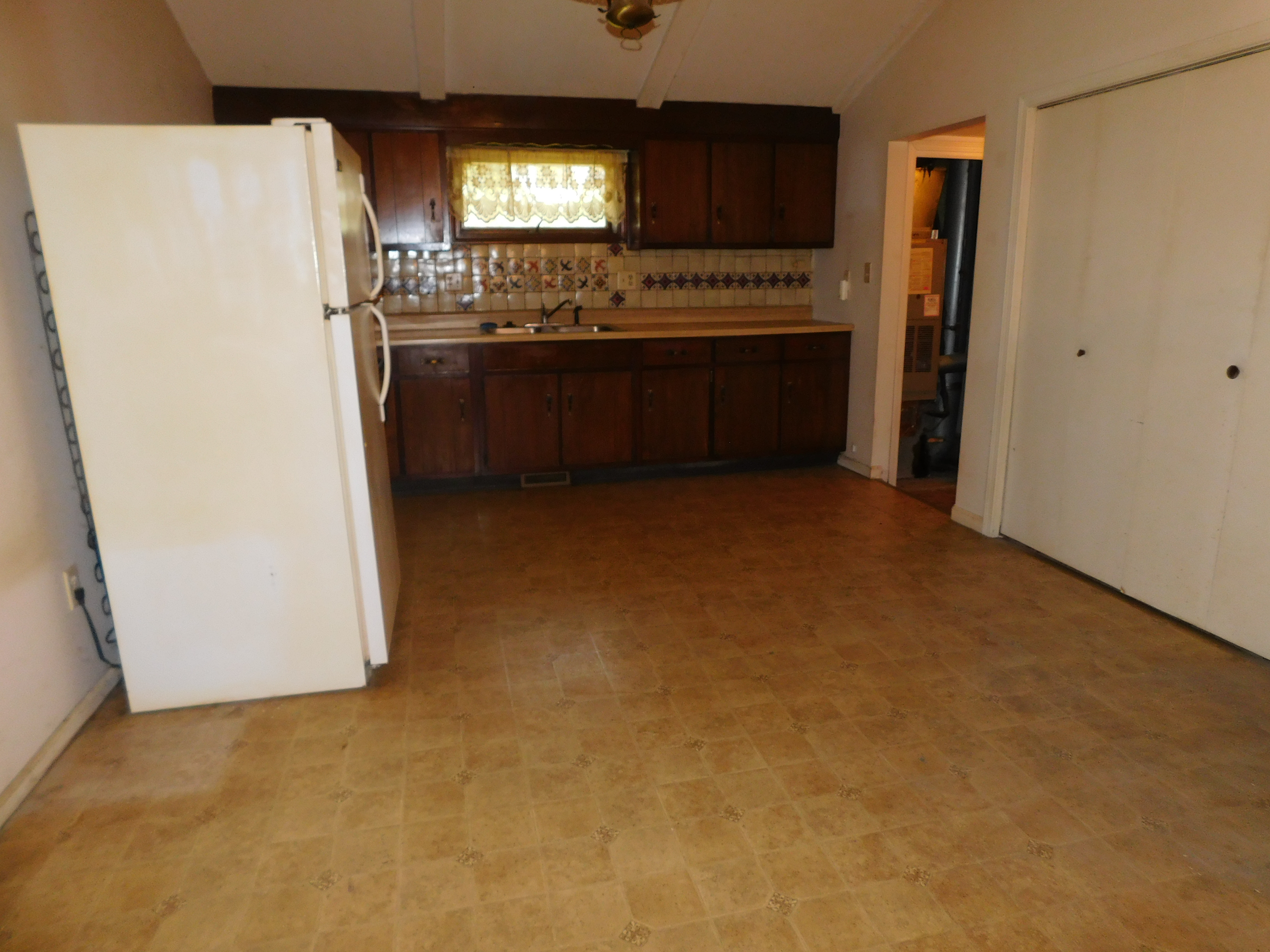 Single family home on 3 city lots in Waynedale area Scheerer