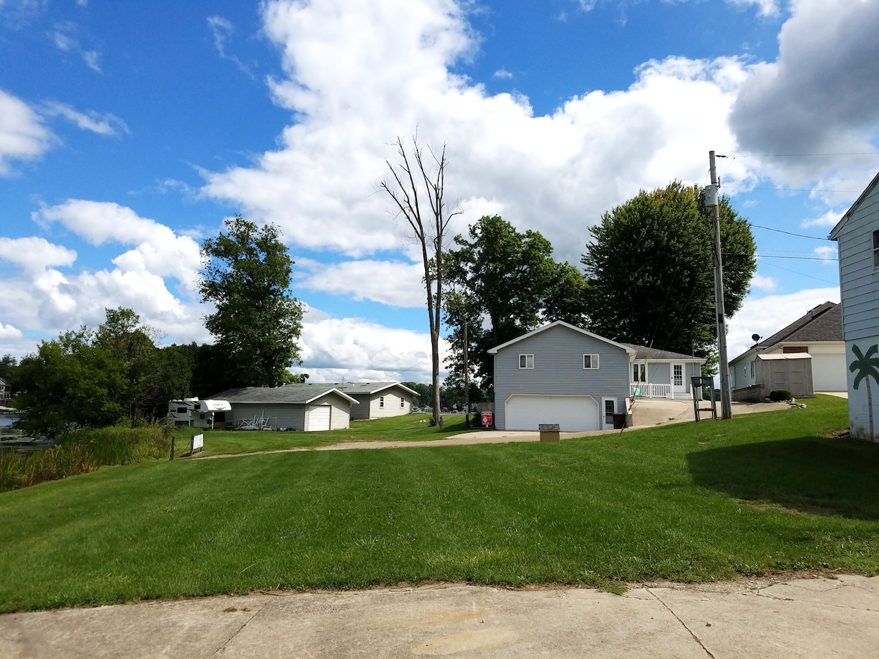 WATERFRONT PROPERTY AUCTION ON BIG LONG LAKE Scheerer McCulloch