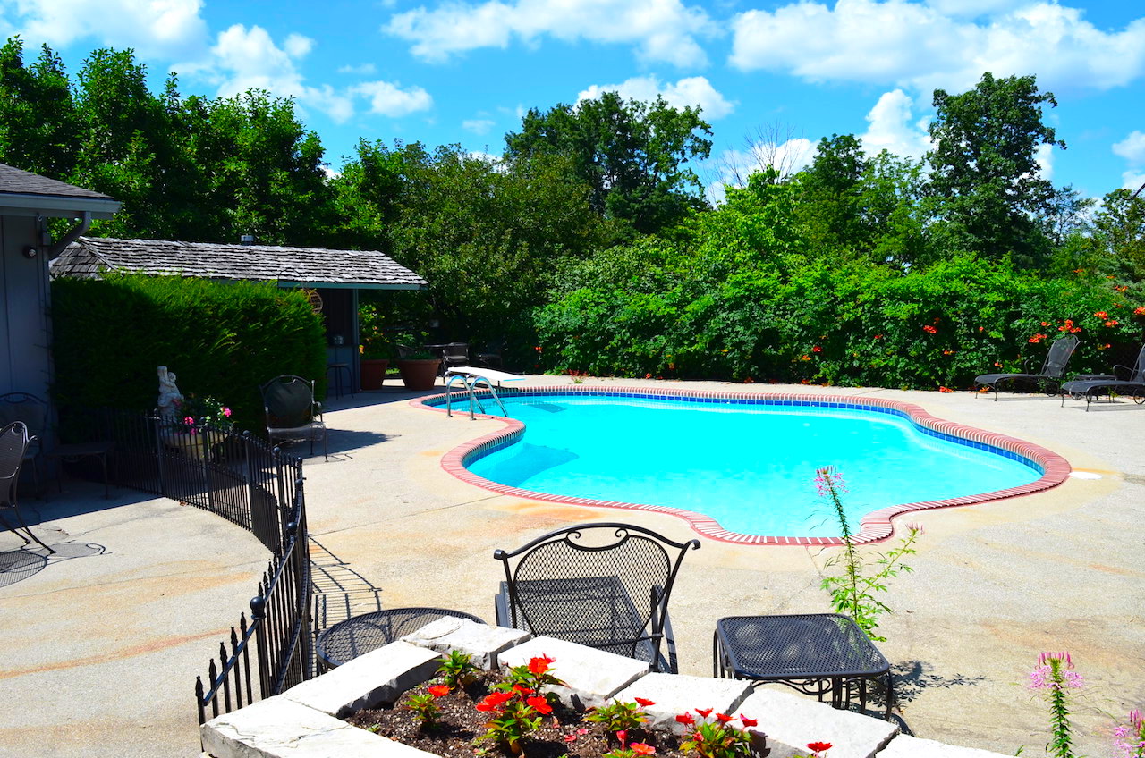 Well maintained MidCentury Modern Roanoke home sitting on 10 acres