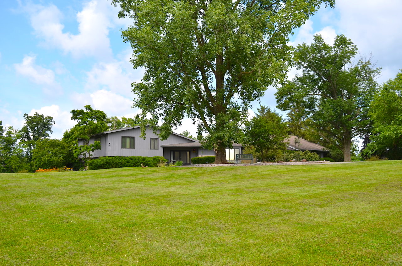 Well maintained MidCentury Modern Roanoke home sitting on 10 acres