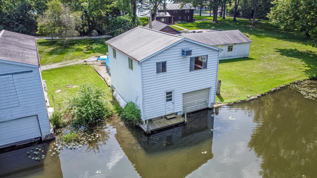 Lakefront Home, Boat House, & Vacant Lots Selling in Multi Tract Auction on Lake Wawasee