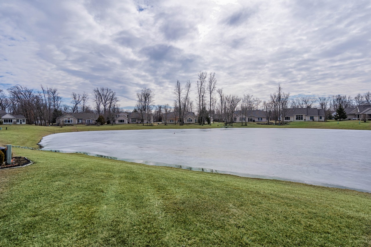 BEAUTIFUL 4 BR 2 BA WATERFRONT VILLAMINIUM IN ABOITE TOWNSHIP