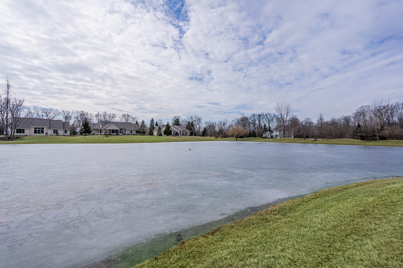 BEAUTIFUL 4 BR 2 BA WATERFRONT VILLAMINIUM IN ABOITE TOWNSHIP