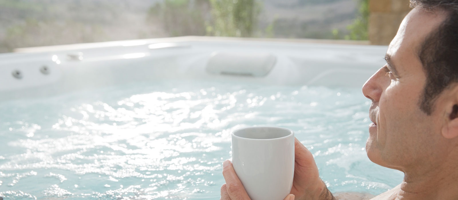 The Benefits of a Hot Spring Spa Backyard Oasis